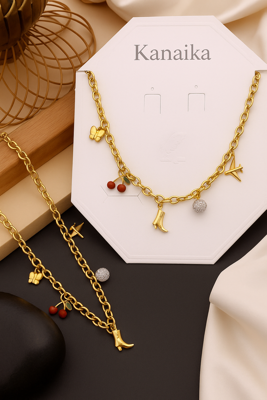🍒 Kanaika Charm Story Necklace – Playful Icons in Gold ✈️👢🦋